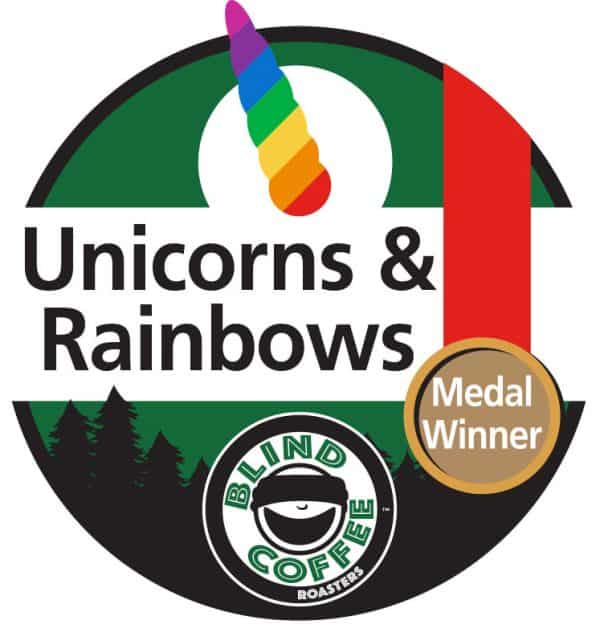 Unicorns and Rainbows Icon with Blind Coffee logo and a rainbow colored unicorn horn and a medal