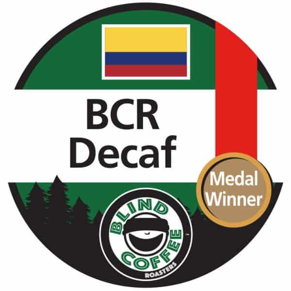 Decaf Icon with Blind Coffee logo and the Colombian flag and a medal